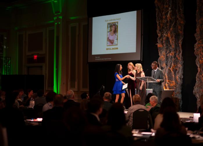 Riya Jacob receives the Rudy Leadership Award at the Leadership Awards Ceremony in the Baker University Center Ballroom
