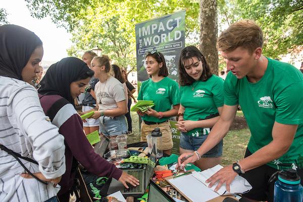 GIVE members talk to students about signing up during the 2019 Involvement Fair. Photo by Hannah Ruhoff