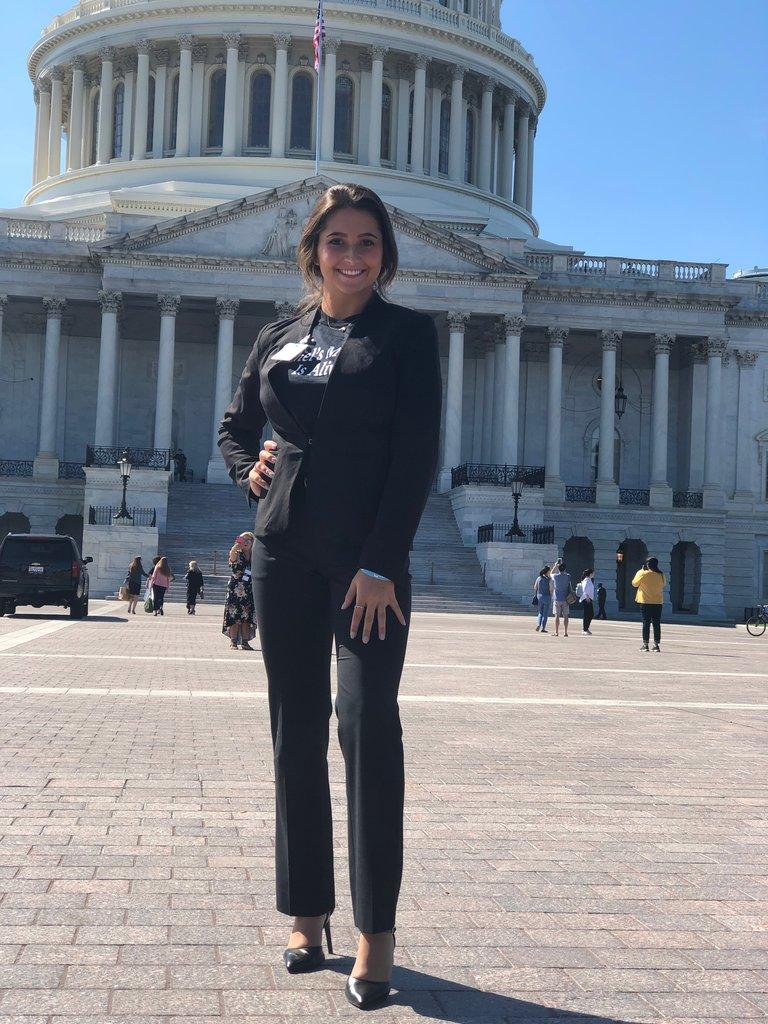 Katie Bender stands outside the Capitol Building.