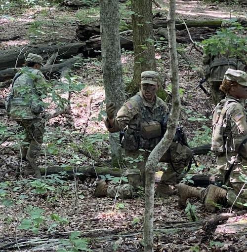 Cadets in the woods wearing camoflague