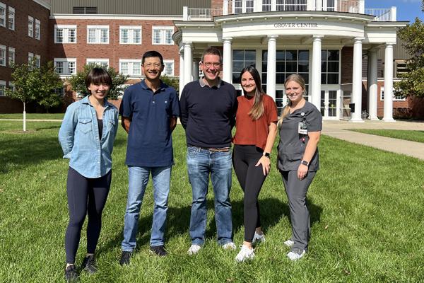 Drs. Li Xu and Mark Gibson with students.