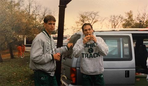 Sam Chamberlain eating a burger at OHIO with a friend