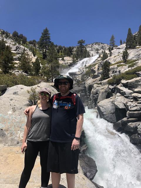 Rob Dorans and his wife hiking in the mountains