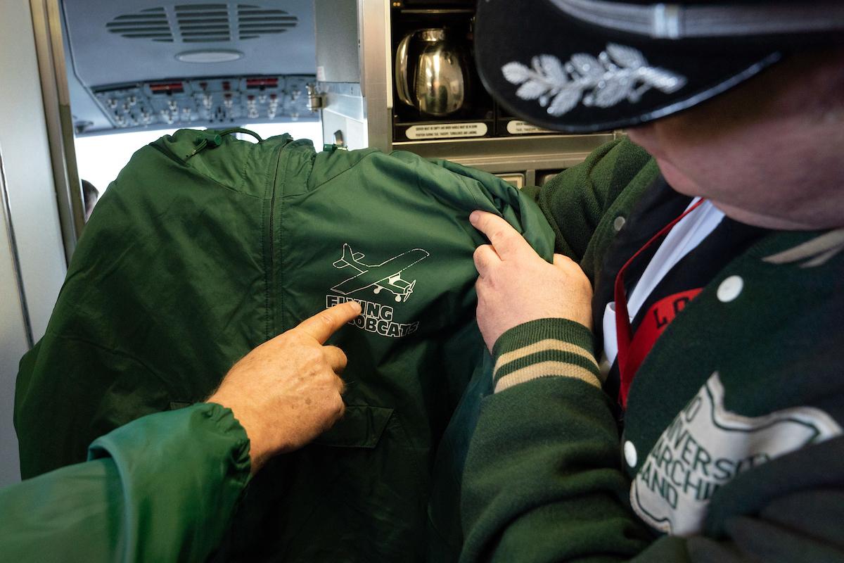 Dan Sneddon shows off his Flying Bobcats jacket.