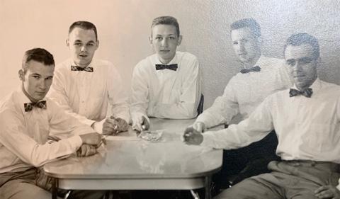 George Lucas and his fellow pre-med students, dressed in button-downs and bowties, sitting together at a table in the 50s