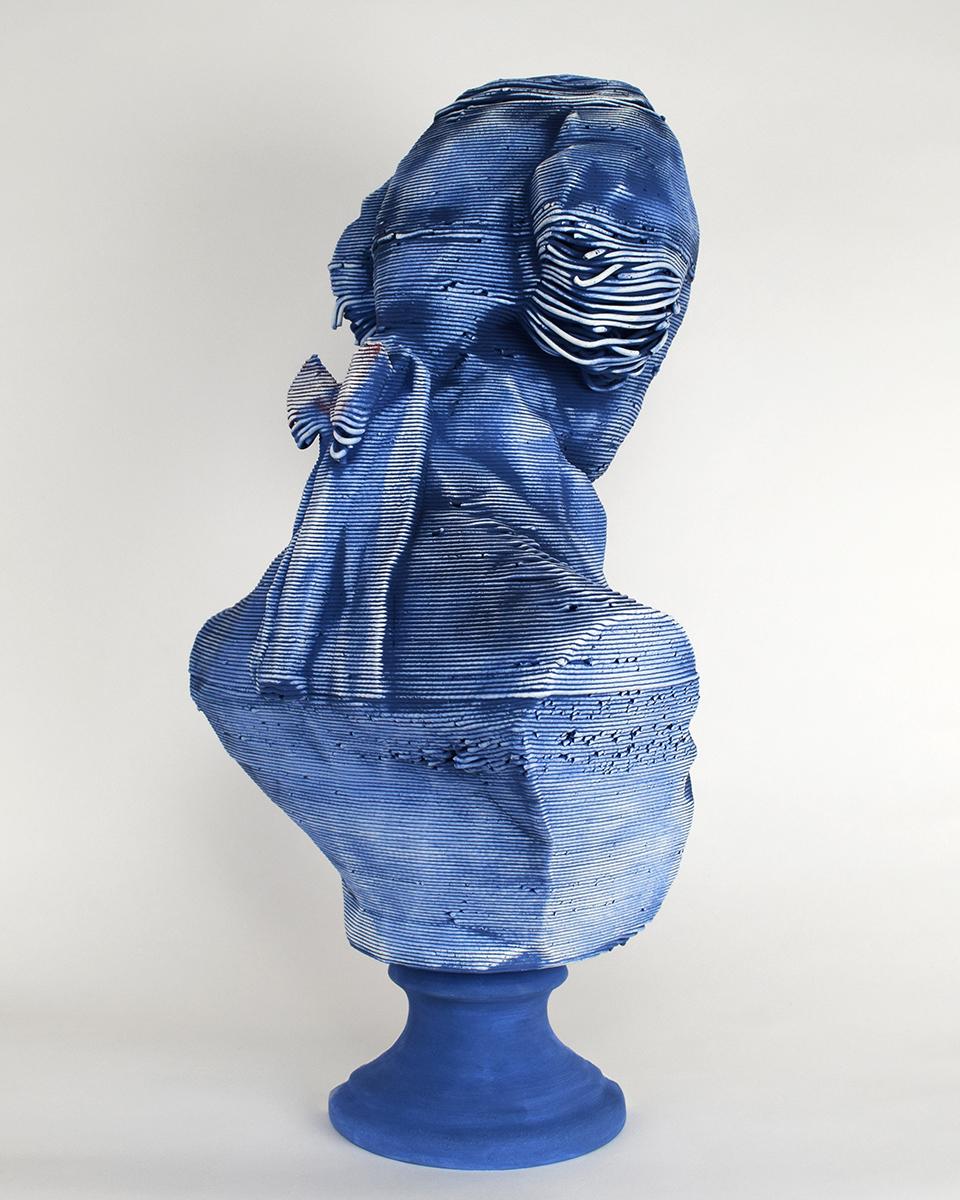 Display of a blue ceramic object; Bri Murphy, MFA thesis project