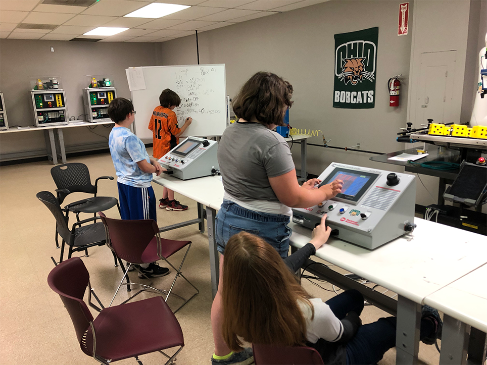 Middle school students at robotics camp