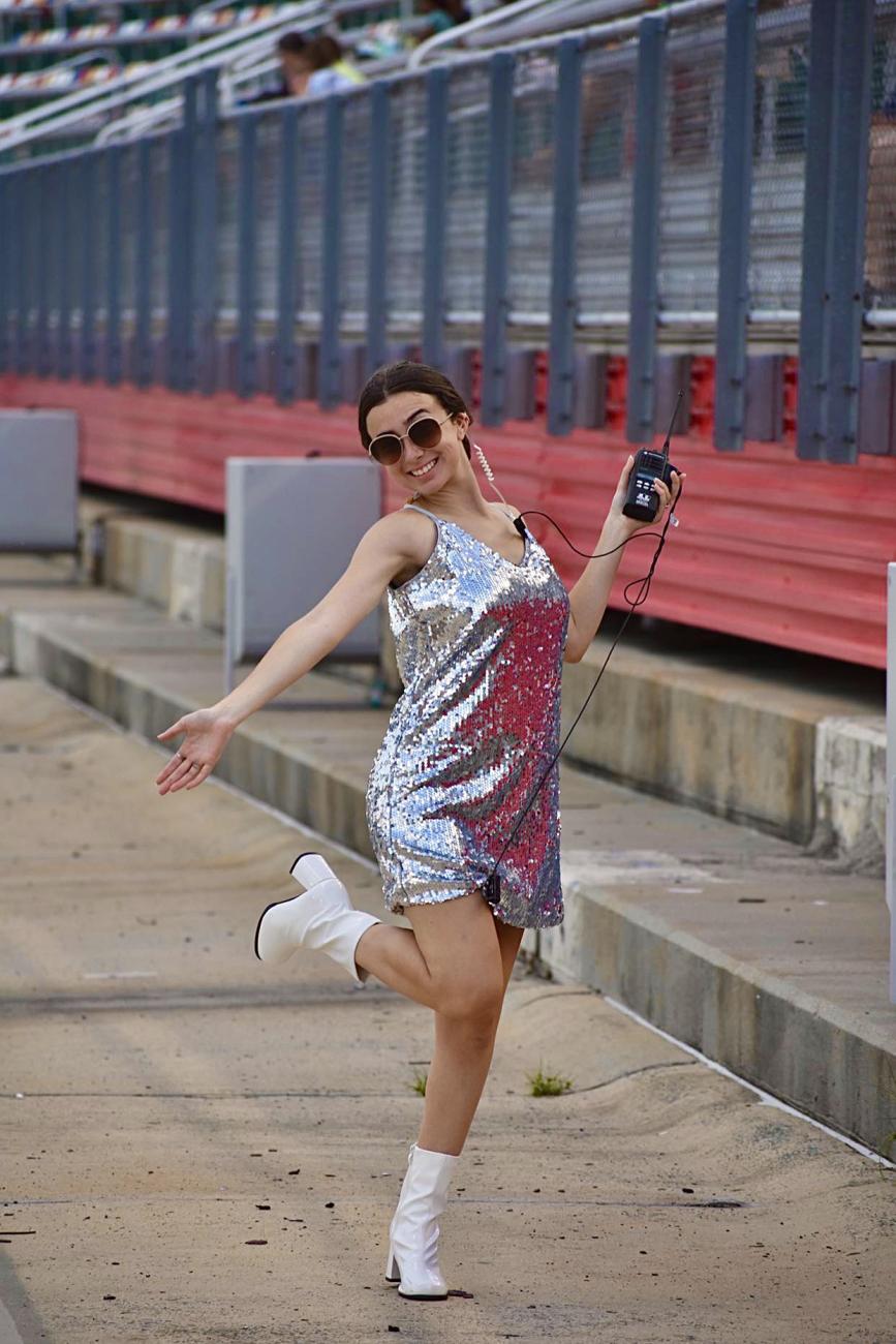 Spinale poses at Charlotte Motor Speedway over the summer. 