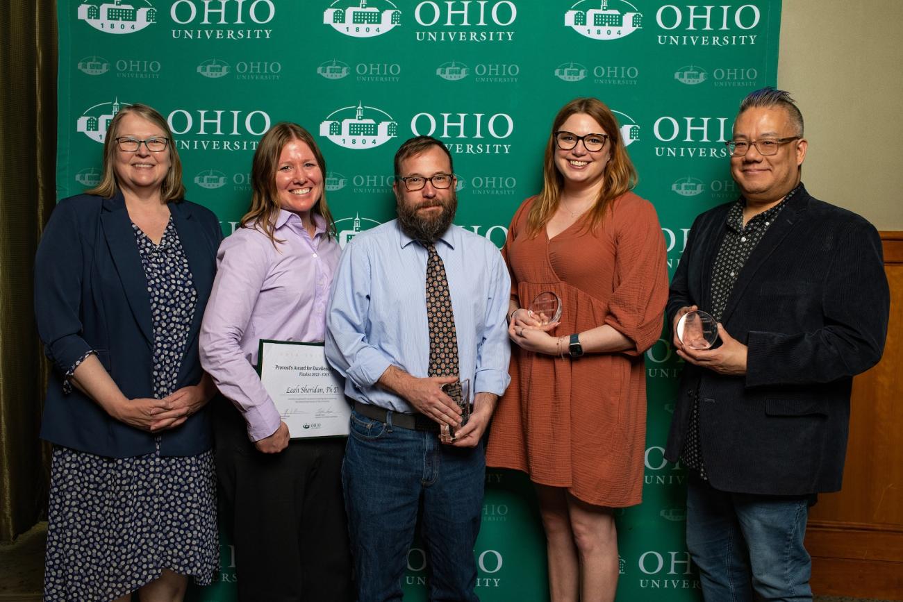 Dr. Elizabeth Sayrs is shown with Paul Shovlin, Christina Wright, Edmond Chang and Danielle Feeney