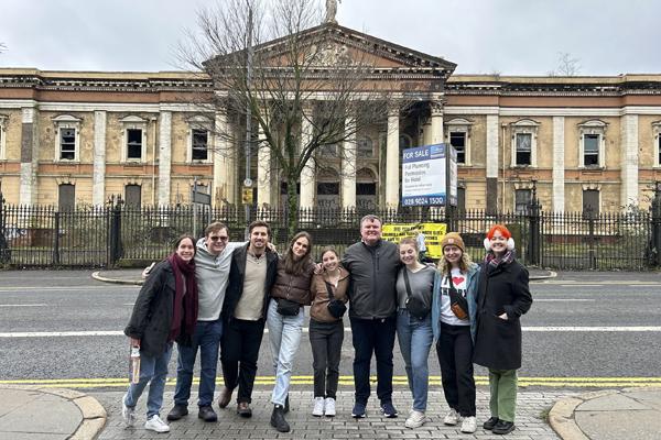 Larry Hayman and students in Northern Ireland