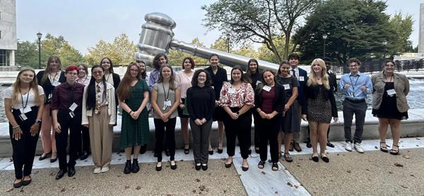 Students stop for a group photo outside the Supreme Court of Ohio.