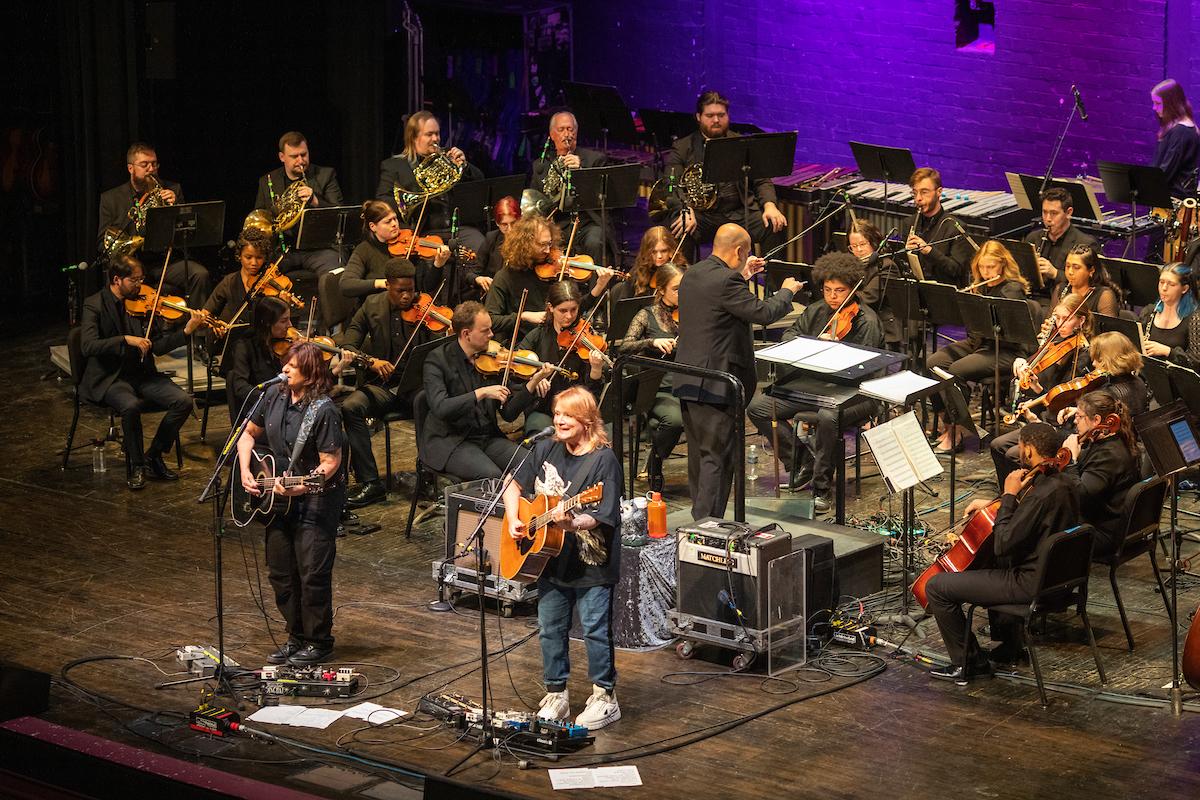 Students and faculty from the Ohio University School of Music play a concert on campus with The Indigo Girls
