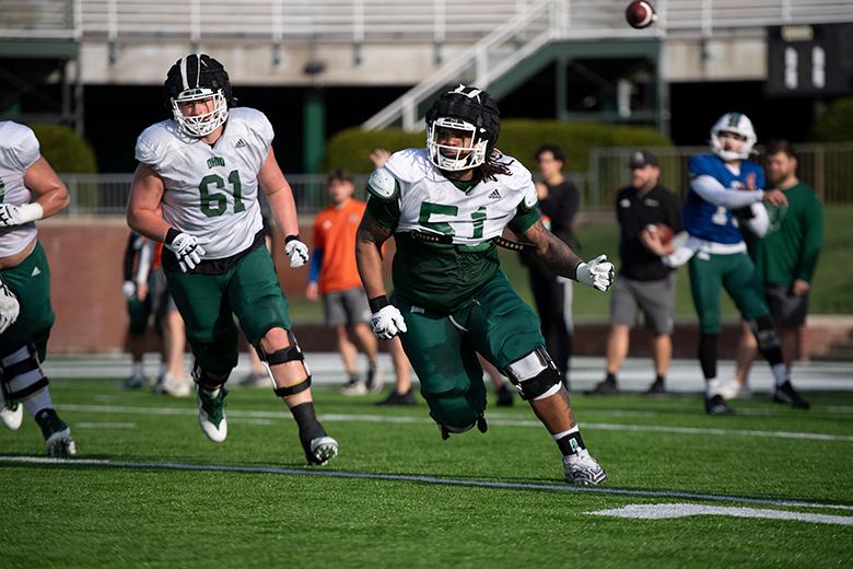 OHIO Football players wear Guardian Caps during practice to help reduce the risk of concussions.