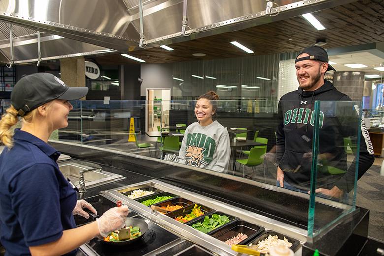 Students select a customized meal at The District.