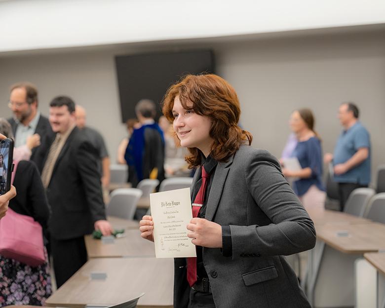 An Ohio University student is initiated into Phi Beta Kappa.