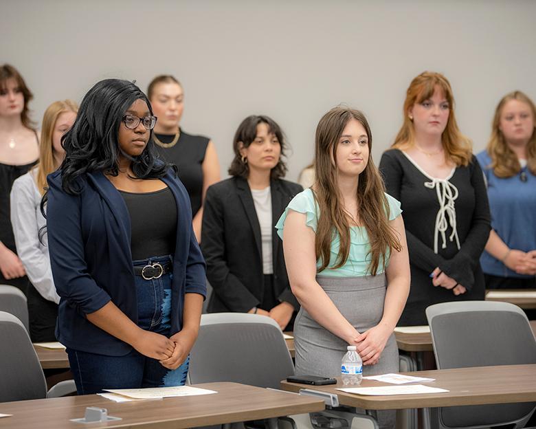 Phi Beta Kappa students stand at the 2025 initiation ceremony.