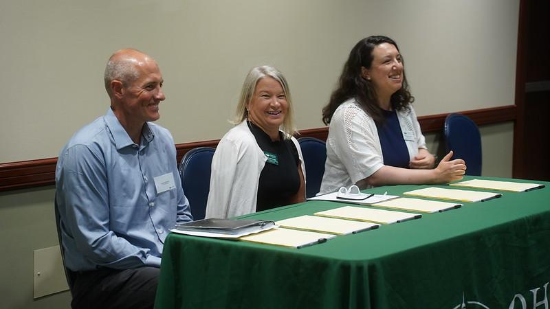 Clayton Newman, Laurie McKnight and Nukhet Sandal lead a panel discussion at the regional event