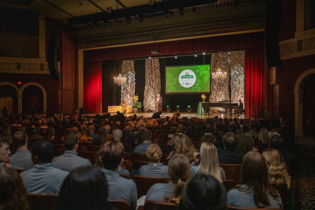 The audience watches the Alumni Awards presentation in Templeton-Blackburn Alumni Memorial Auditorium