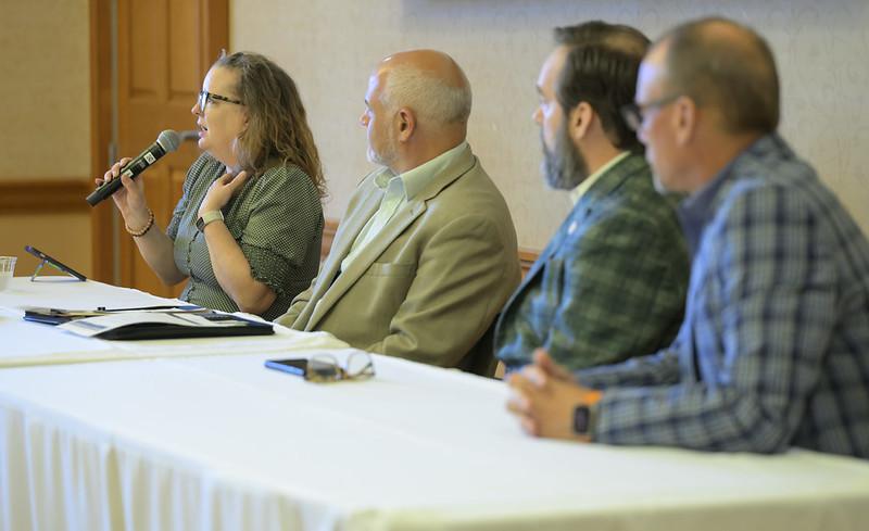 Panel members lead a discussion during Public Service Day