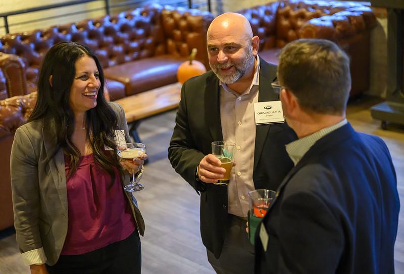 OHIO Alumni and Friends enjoy drinks and talking with each other at Jackie O's On Fourth in Columbus