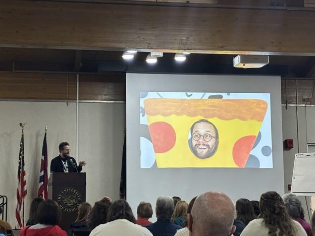 Andy J. Pizza leads a presentation at the MAZZA Conference