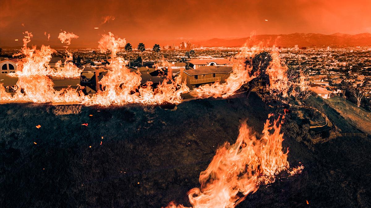 Fires burn a neighborhood in Los Angeles in January 2025.