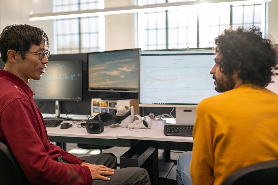 An Ohio University faculty member works with a student. 