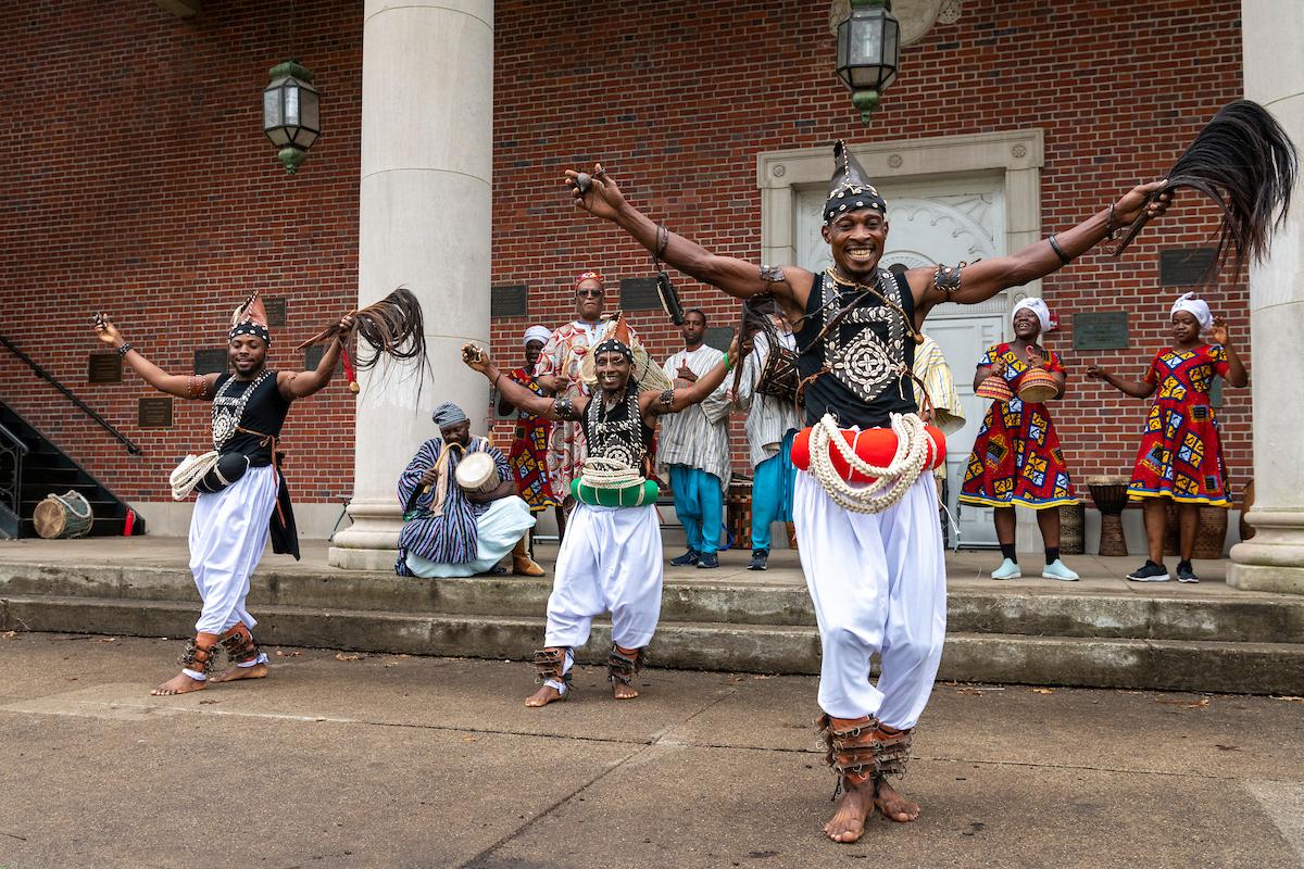 Dancers perform on the College Green while Paschal Yao Younge and others are in the background