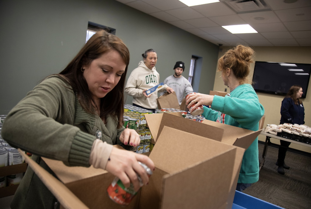 Volunteers work at the Heritage Community Clinic Food Pantry