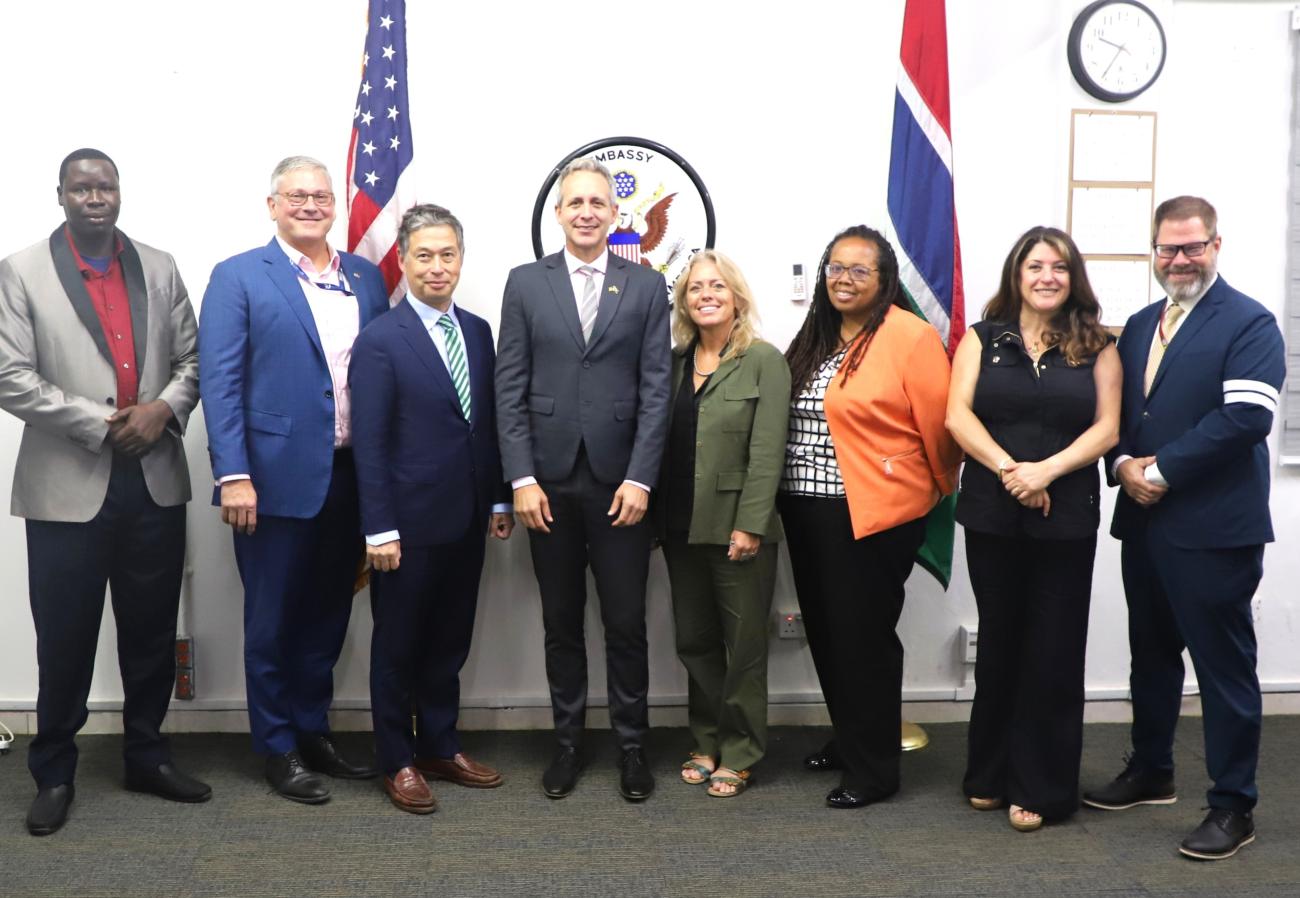 Ohio University representatives stand with officials from West Africa