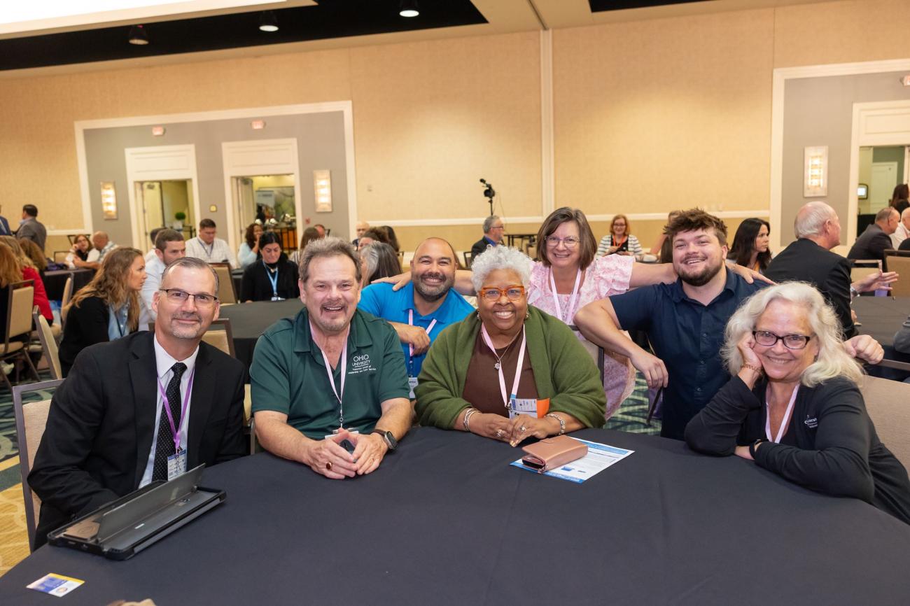 OHIO Apex Accelerator representatives sit together at a table at the national conference