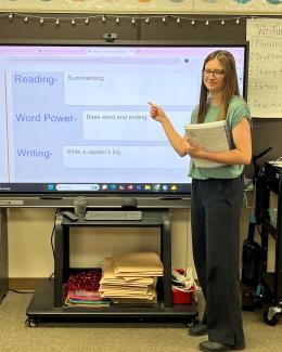 Young female teacher providing instruction