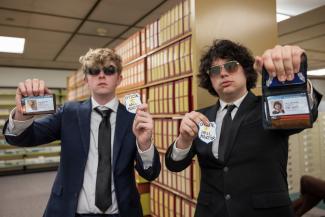 Student pose with fake police badges