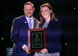 HCOM alum Jessica Harrah receives award at OOS