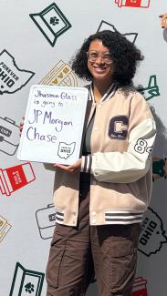 OHIO COB student Jhasmin Glass holding a sign saying she is going to JP Morgan Chase for her summer internship.