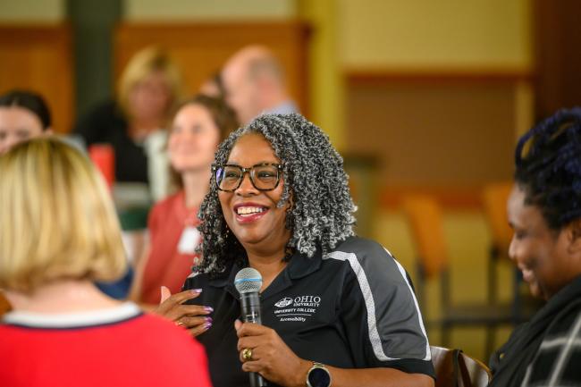 A University College representative speaks at the Student Success Summit