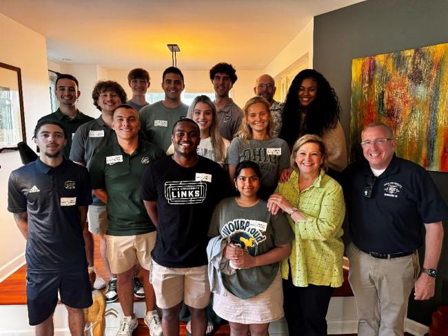 President Gonzalez is shown with members of the Presidential Ambassadors program