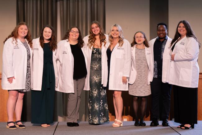Ohio University audiology program 2025 White Coat Ceremony doctoral recipients posing together