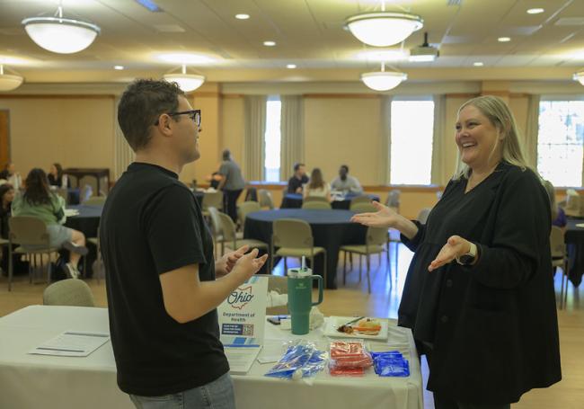 An OHIO student talks with a public office at Public Service Day