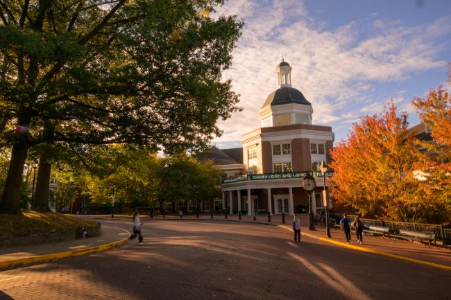 Baker University Center is surrounded by colorful trees on a Fall day