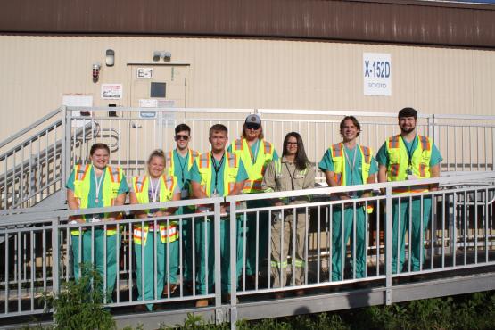 Hagen Childers with group of chemical engineers