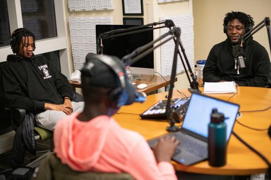 Andrew Owusu, Osahon Ogbebor, and Adam Ward are shown in the podcast studio&quot; loading=&quot;lazy 