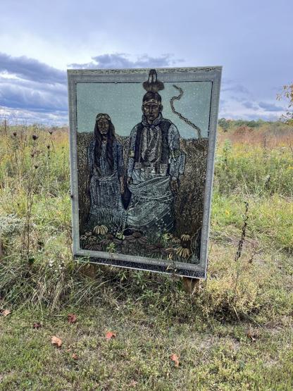 A photo of the Land Acknowledgement Statement at the Woodcock Nature Preserve 