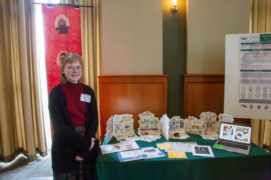  Tristen Luken poses with her thesis 