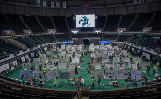  a wide view of student presentations displayed on the center floor of Ohio University&amp;#039;s Convocation Center 