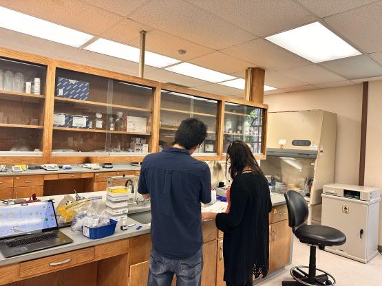  Researchers Oscar Avalos Ovando and Veronica Bahamondes Lorca review notes in OHIO&#039;s Edison Biotechnology Institute. 