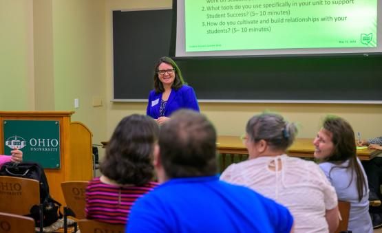 Deb Benton is shown speaking at the Student Success Summit