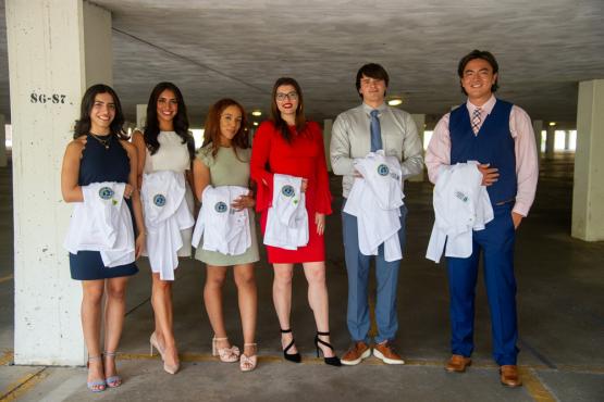 HCOM students before the start of convocation ceremony