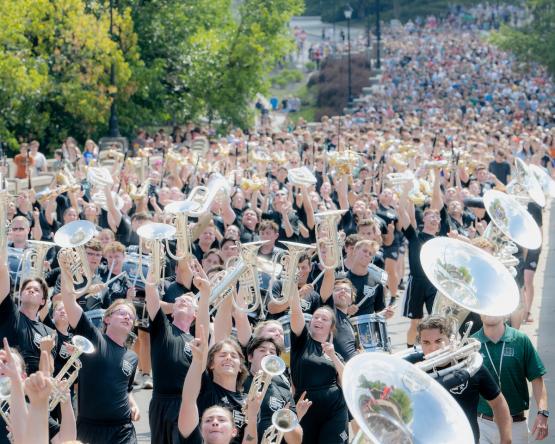  Students walk up Richland Avenue in Athens during Welcome Week 2024 