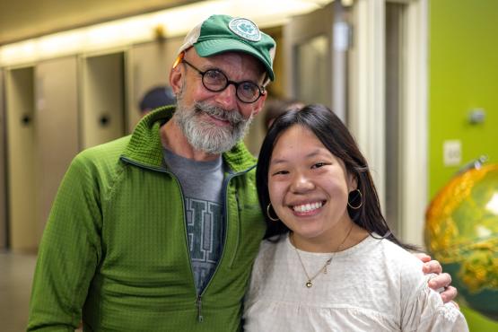 Mimi Calhoun poses for a photo with her father, Jack Calhoun, in Alden Library during Dads Weekend 2023